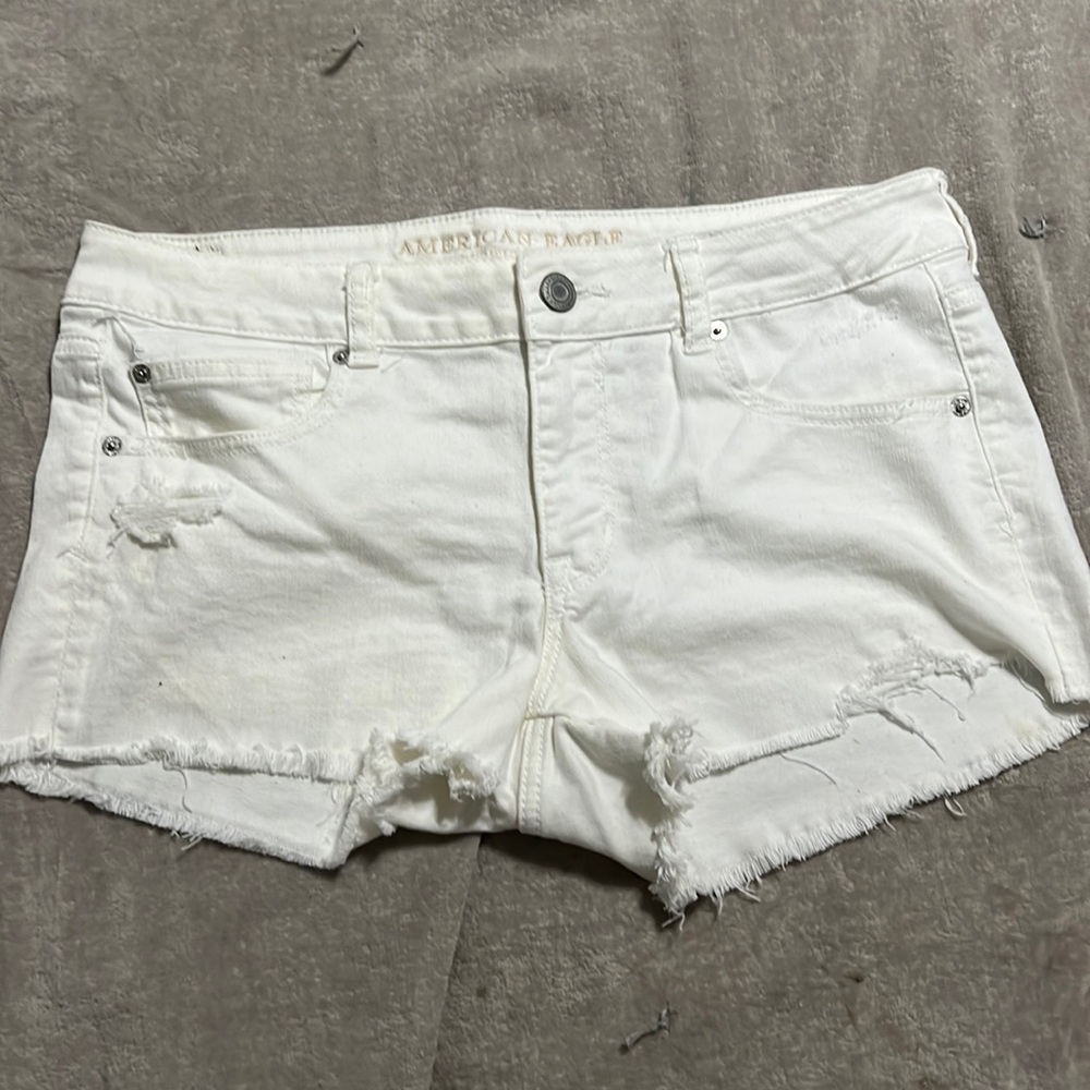 American Eagle white distressed jean shorts